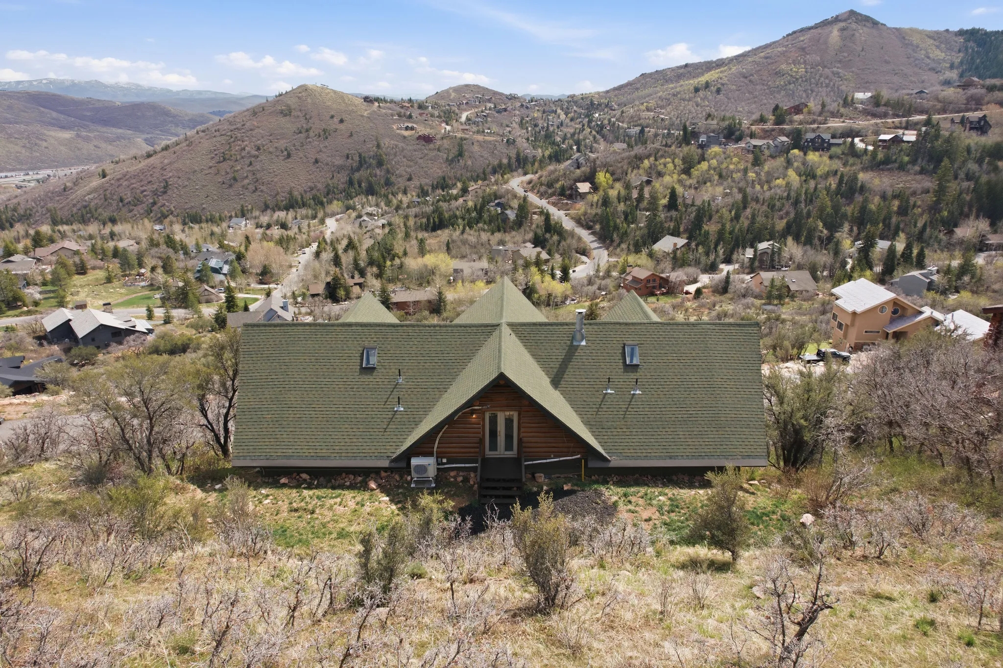 View from above of property with a mountainous background