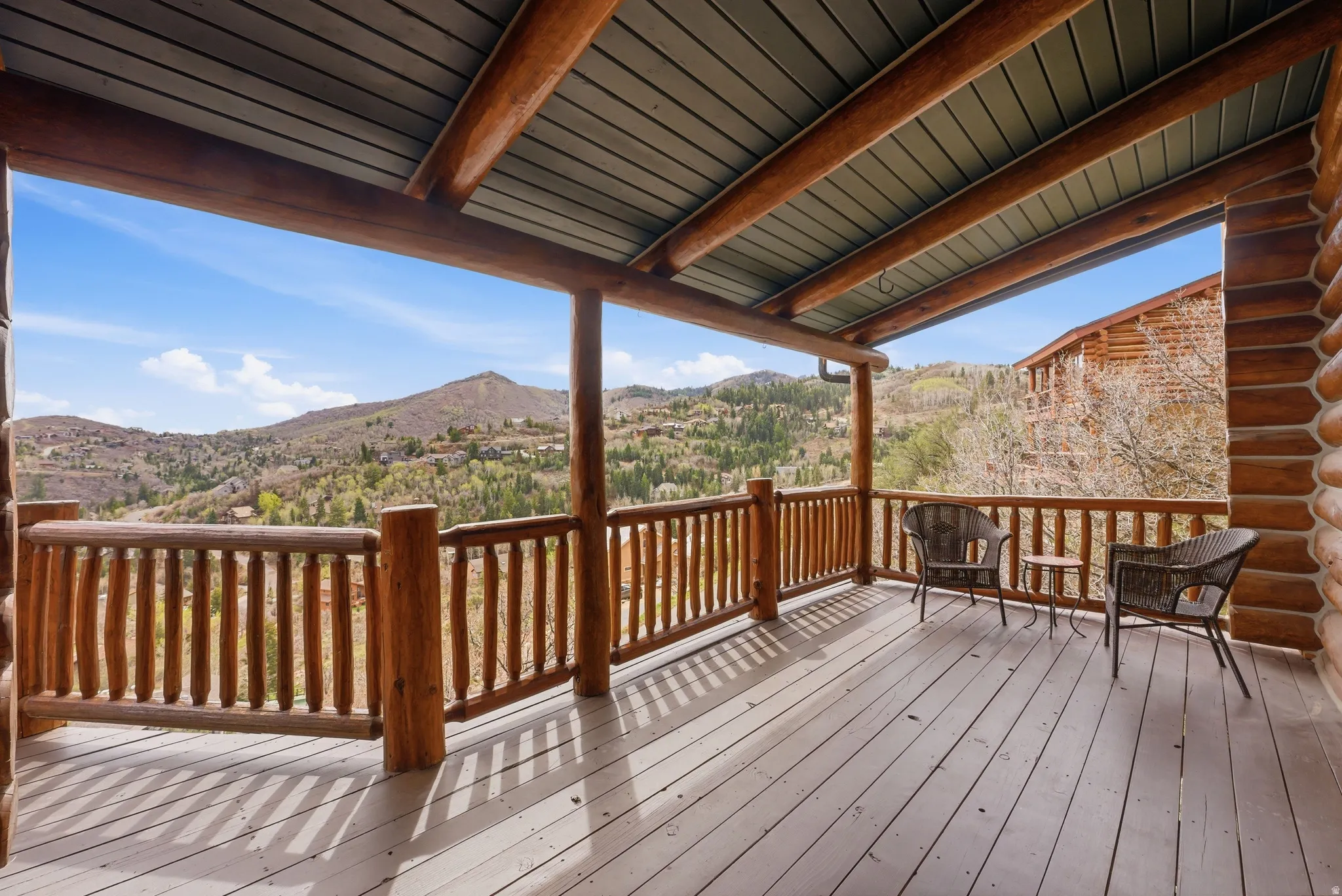 Wooden deck featuring a mountain view