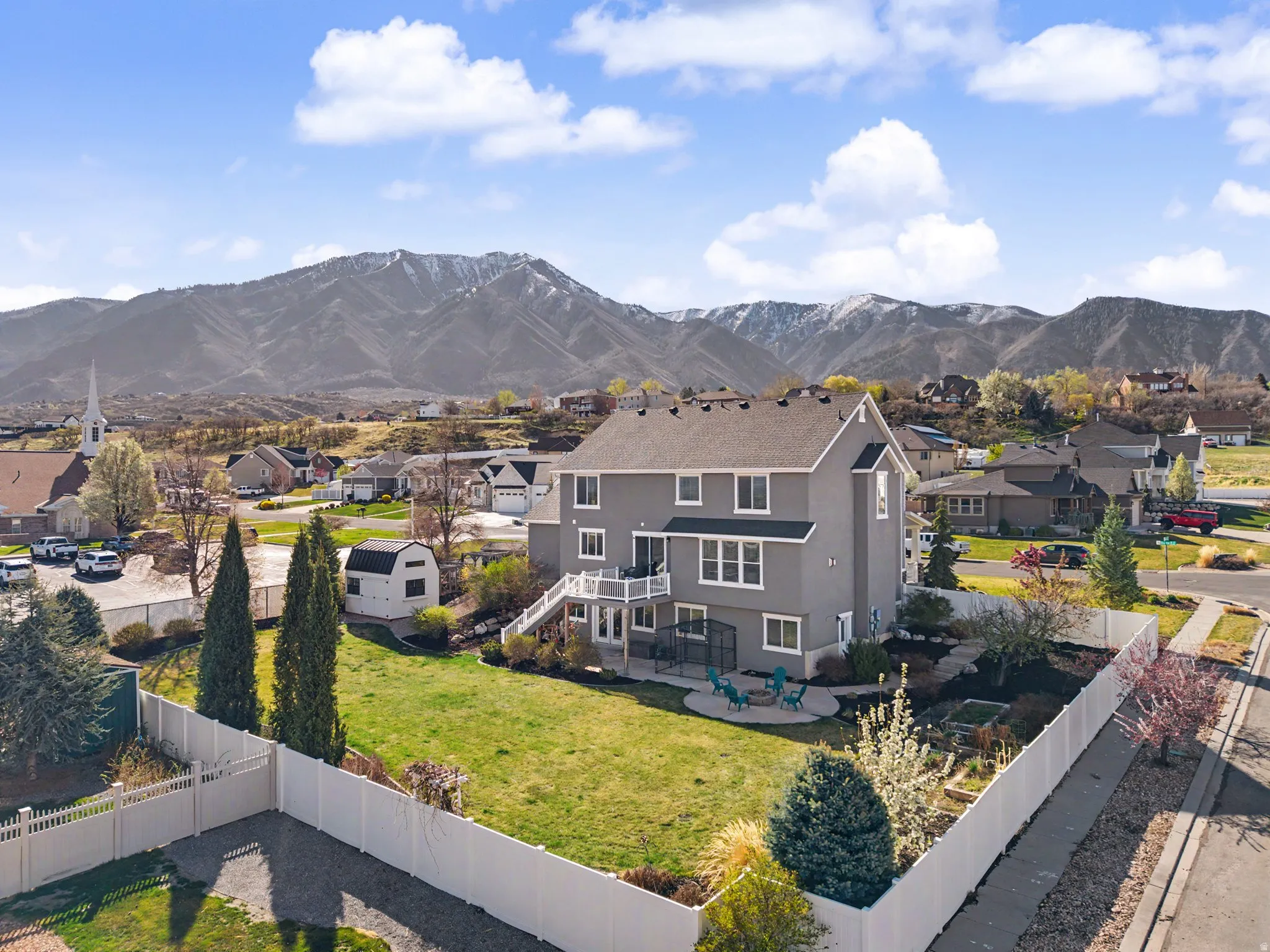 View of mountain backdrop with nearby suburban area
