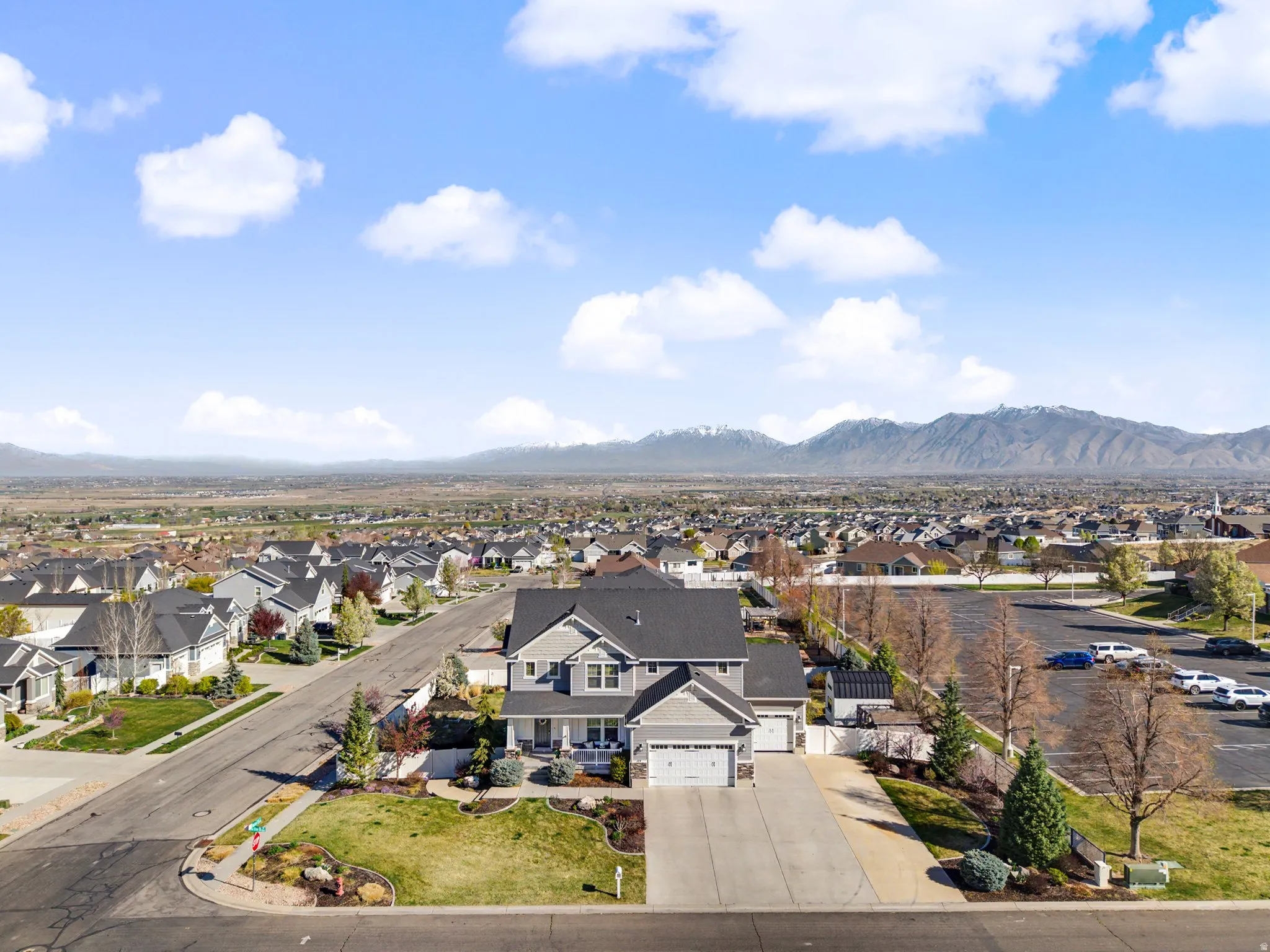 Aerial view of residential area featuring mountains