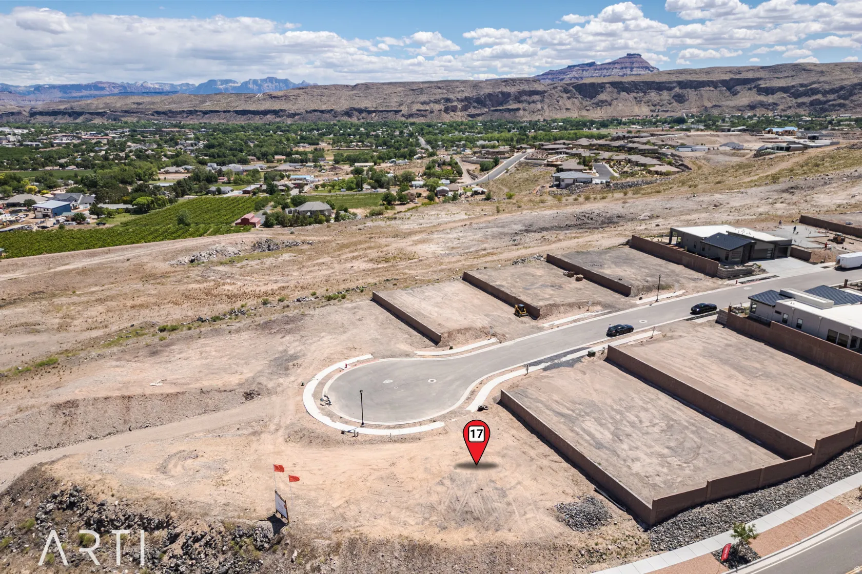 Aerial view of property's location with mountains