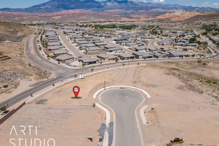 Aerial view of residential area featuring a mountain backdrop
