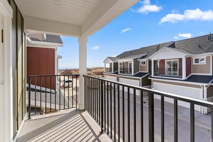 Balcony featuring a residential view