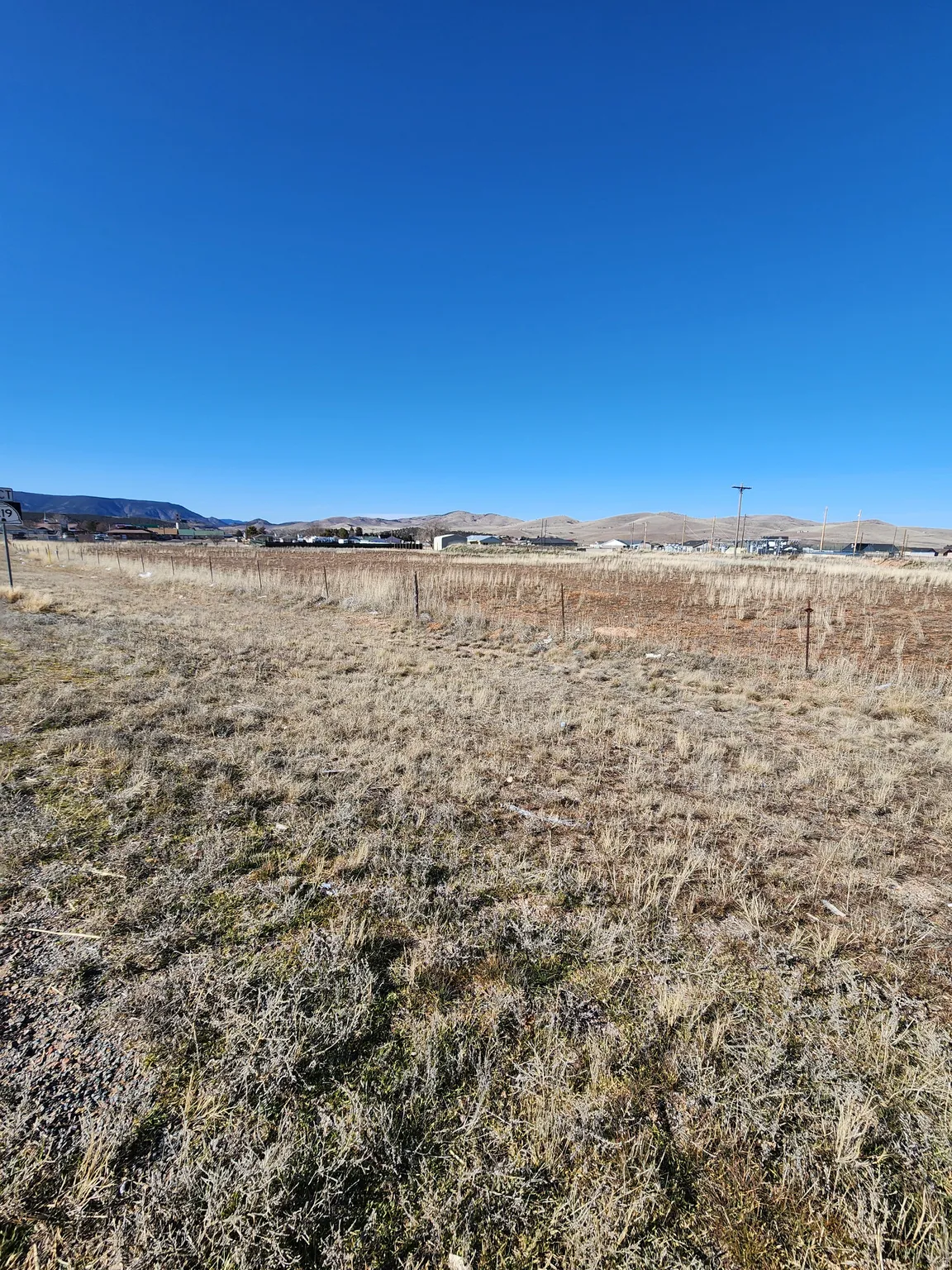 View of yard with a view of rural / pastoral area and a mountain view