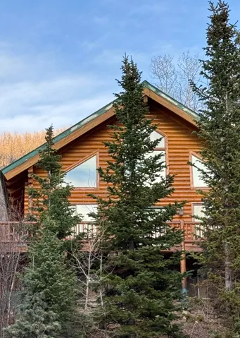View of home's exterior featuring a balcony