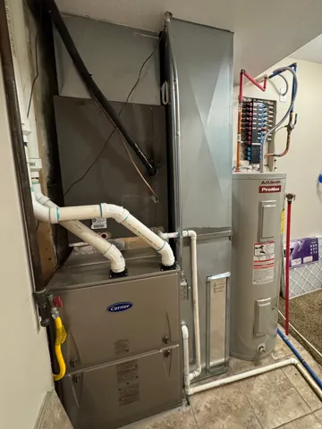 Utility room with heating unit and water heater