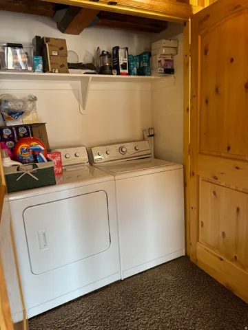 Laundry area featuring separate washer and dryer