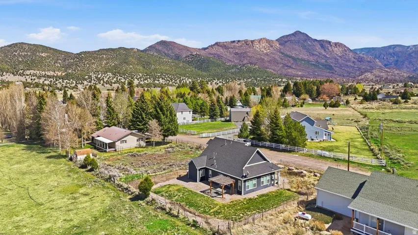 Aerial view of residential area featuring mountains