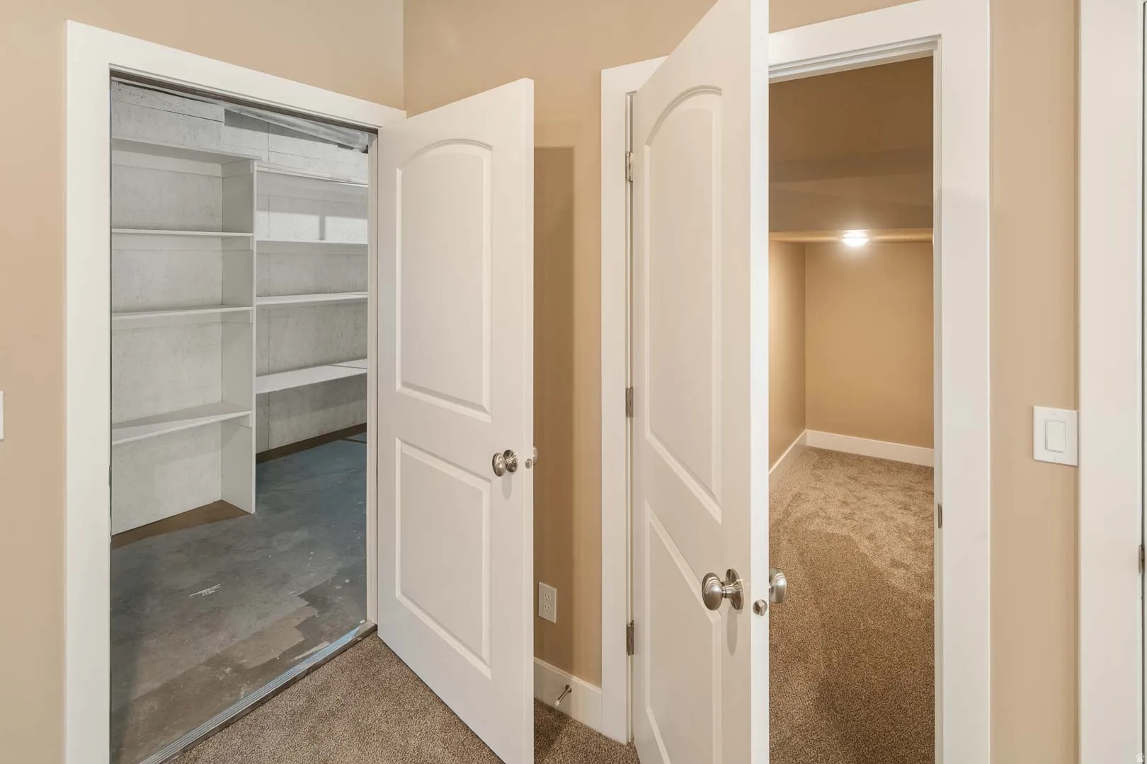 Hallway with light carpet