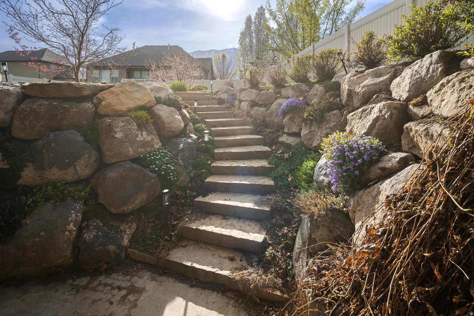 View of yard featuring stairs