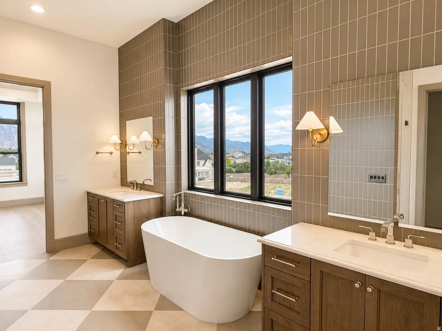 Freestanding soaking tub, dual vanities with light countertops, black-framed windows, vertical tile accent wall, and checkerboard floor tiles