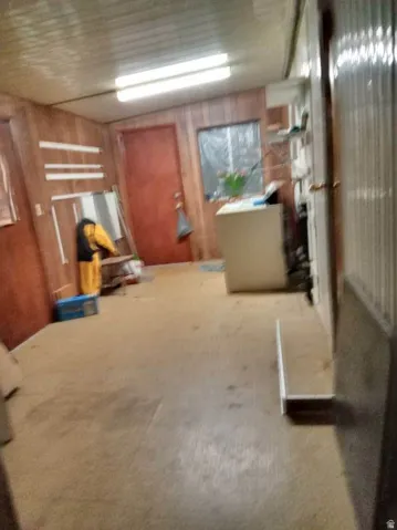 Interior space featuring wooden walls