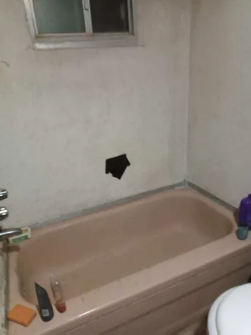 Bathroom featuring a tub