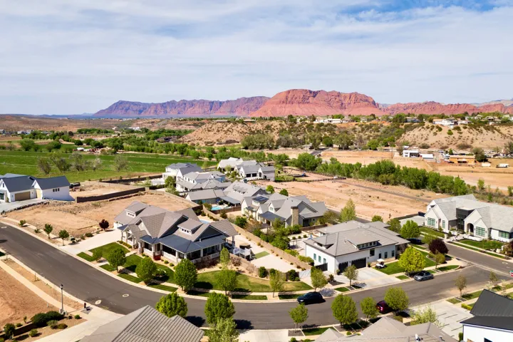 Aerial view of residential area with a mountain backdrop