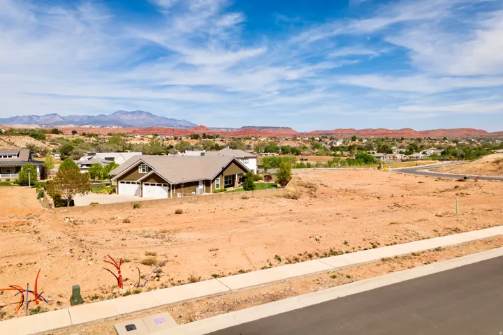 Mountain view featuring nearby suburban area