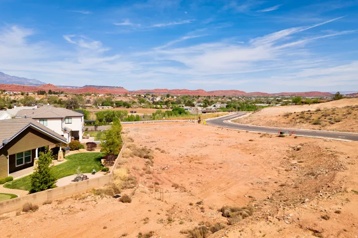 View of mountain backdrop with nearby suburban area