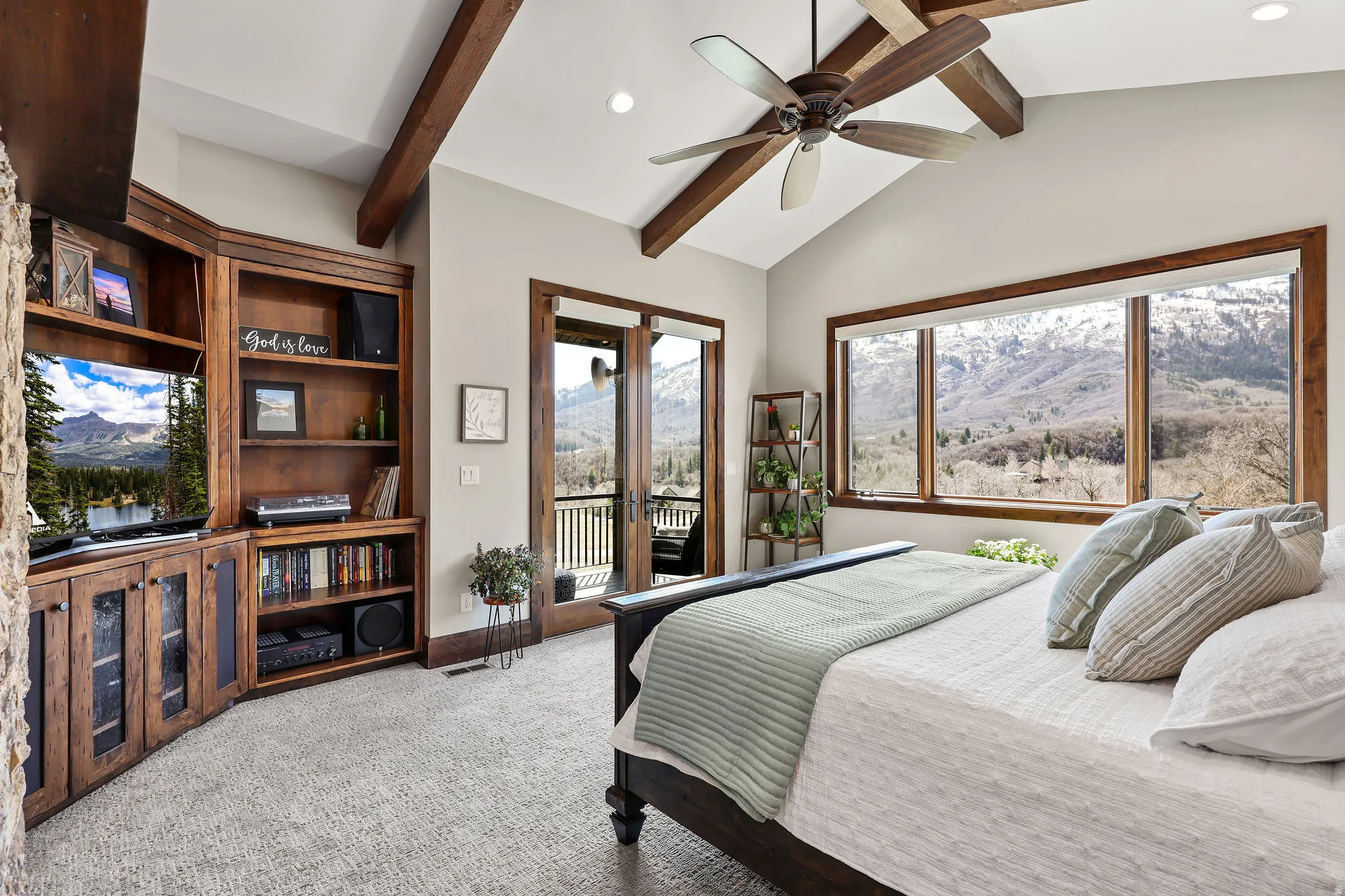 Bedroom featuring light carpet, recessed lighting, a mountain view, a ceiling fan, and access to exterior