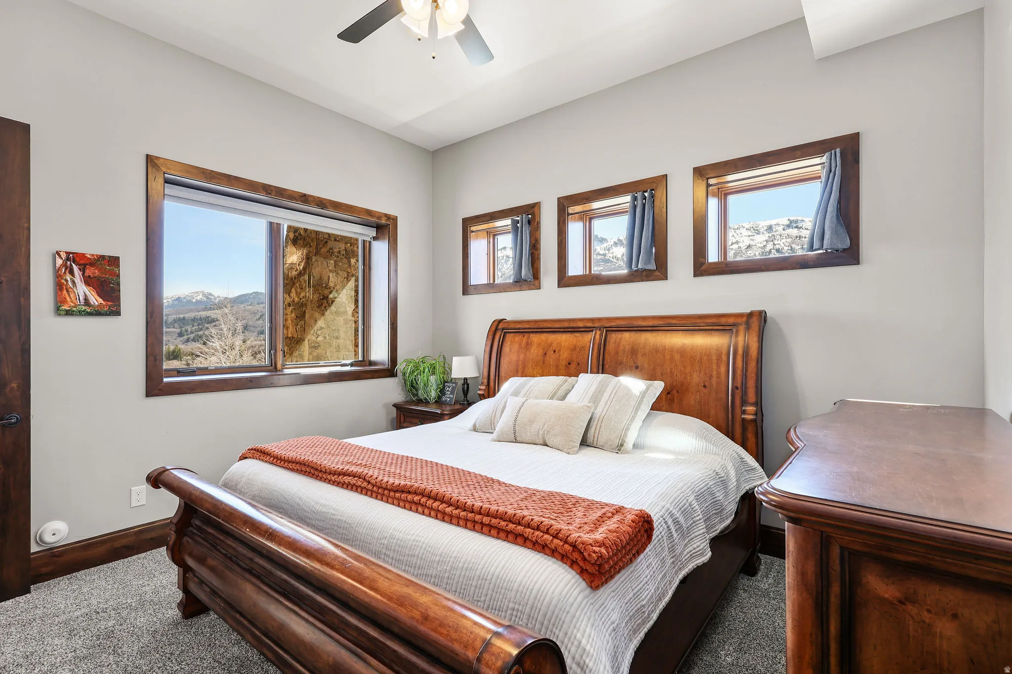 Bedroom featuring carpet floors and a ceiling fan