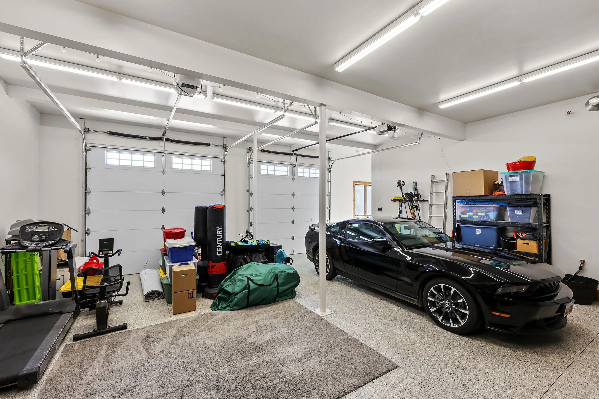 Garage featuring a garage door opener