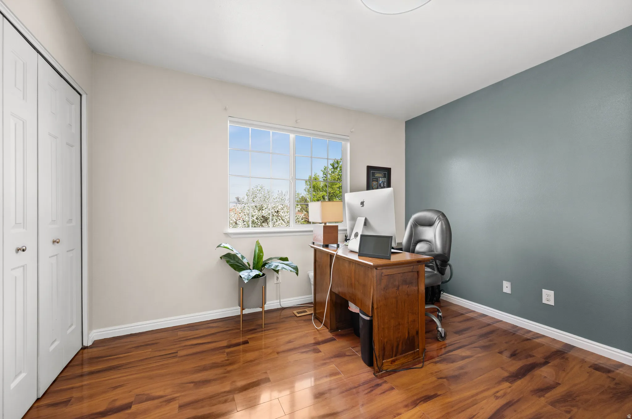 Office or 2nd bedroom featuring wood finished floors.