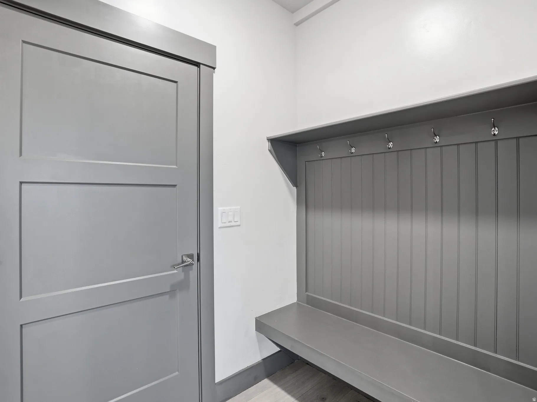 Mudroom featuring light wood-style flooring