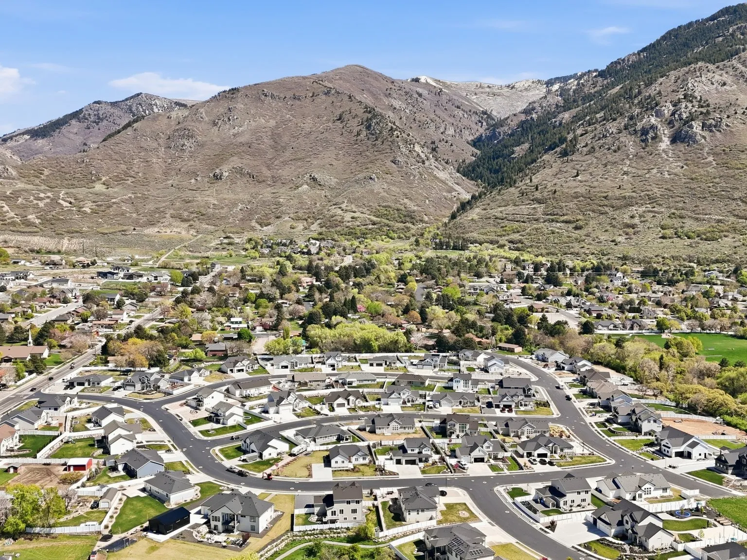Aerial perspective of suburban area with mountains
