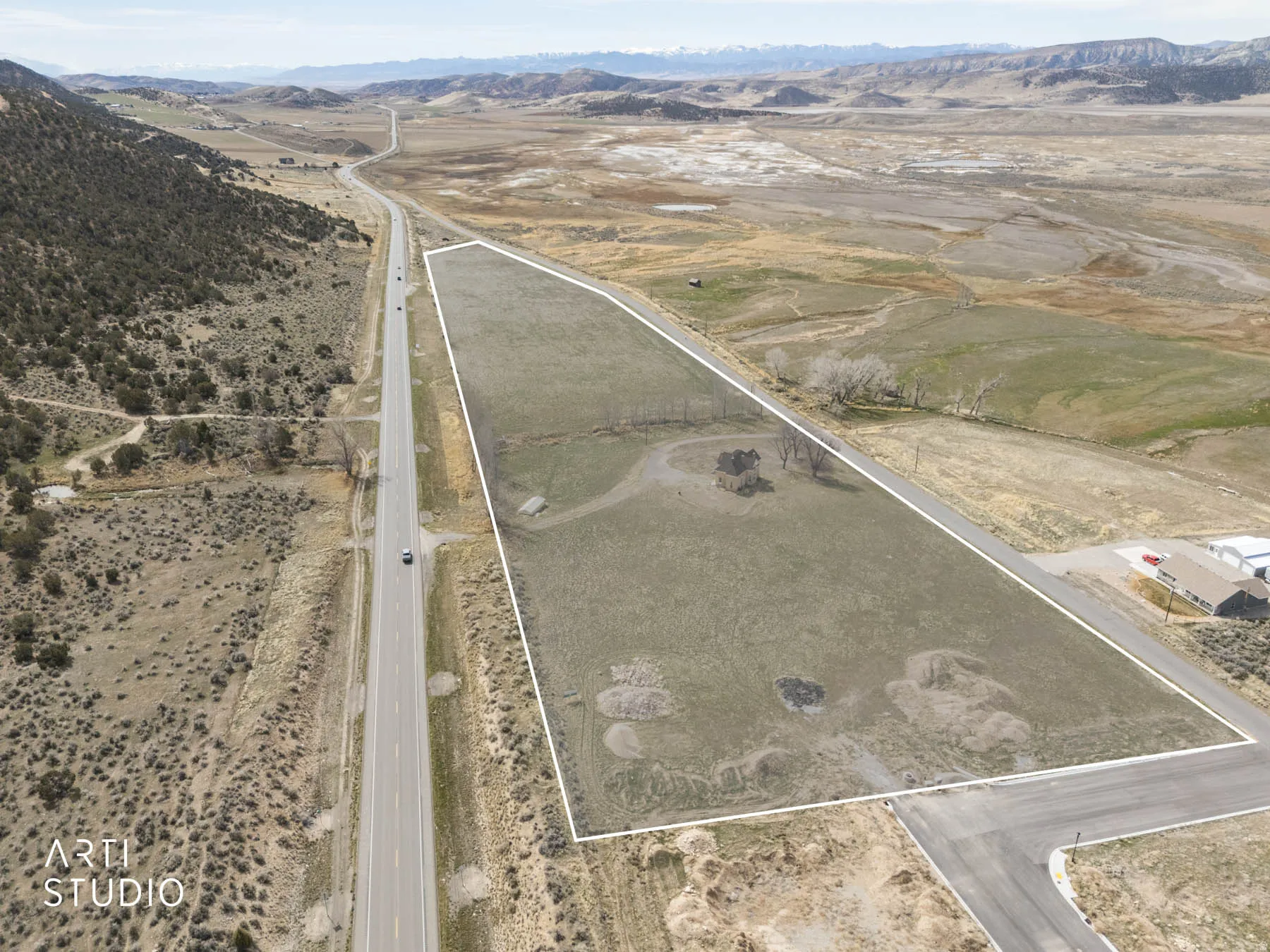 Aerial view of property's location from the north-east corner showing approximate property boundary.