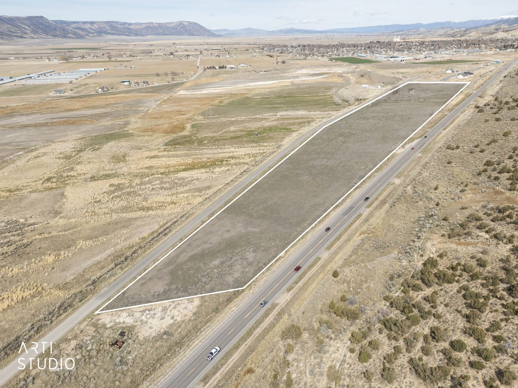 Aerial view looking north towards the house. The shaded overlay shows the approximate boundaries.