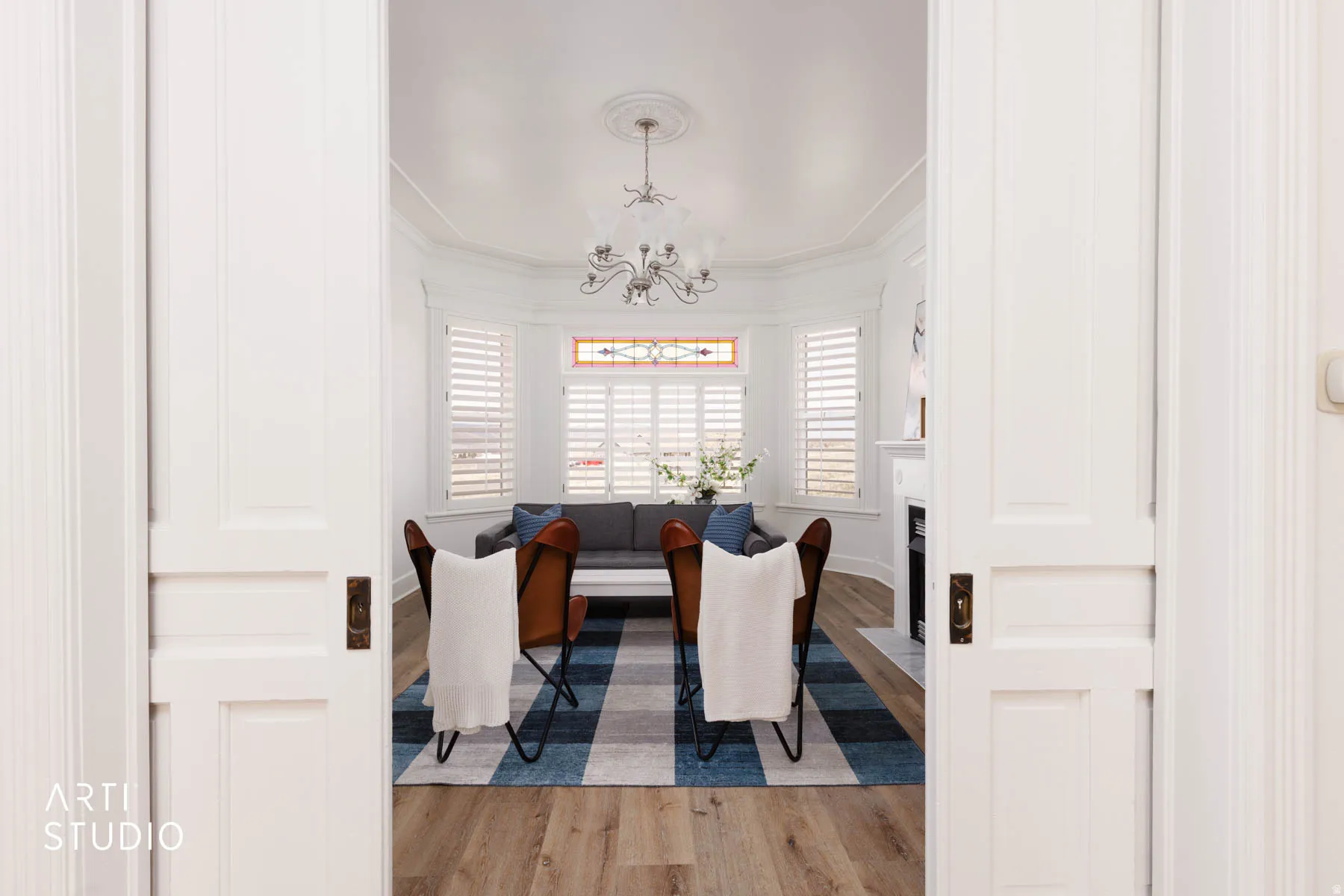 Great Room featuring original pocket doors.
