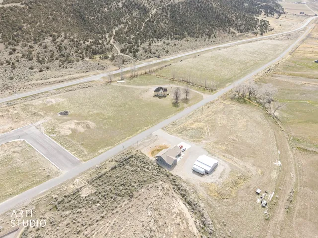 Aerial view of property and surrounding area from the northwest corner