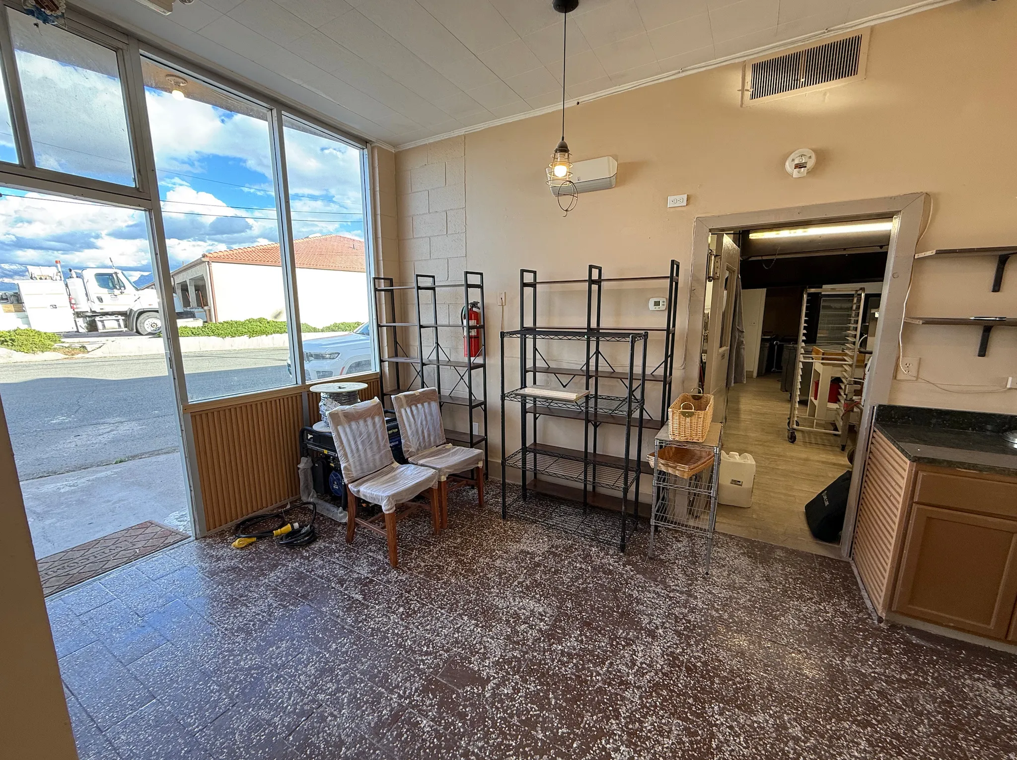 Living area featuring ornamental molding