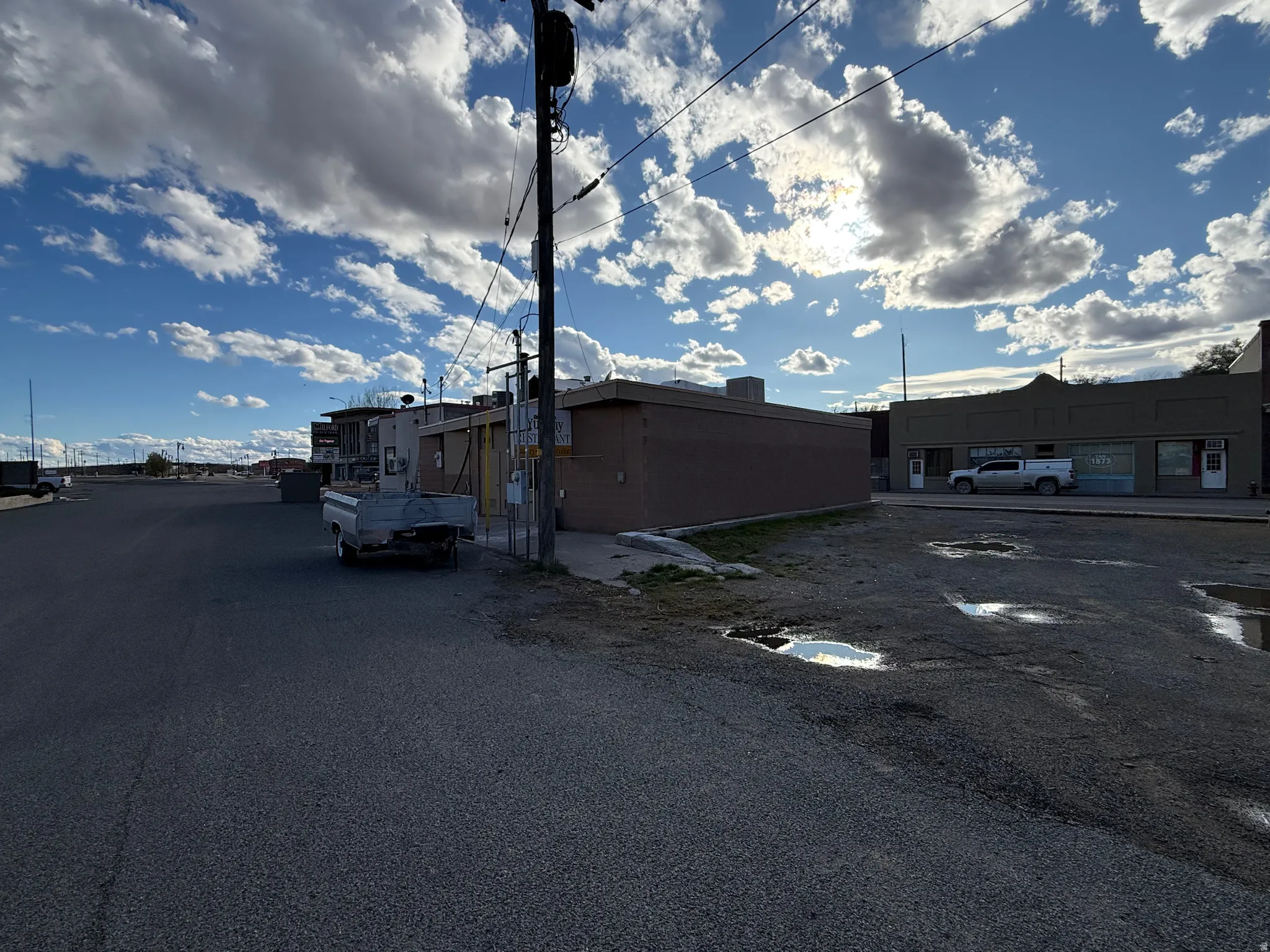 View of property with uncovered parking