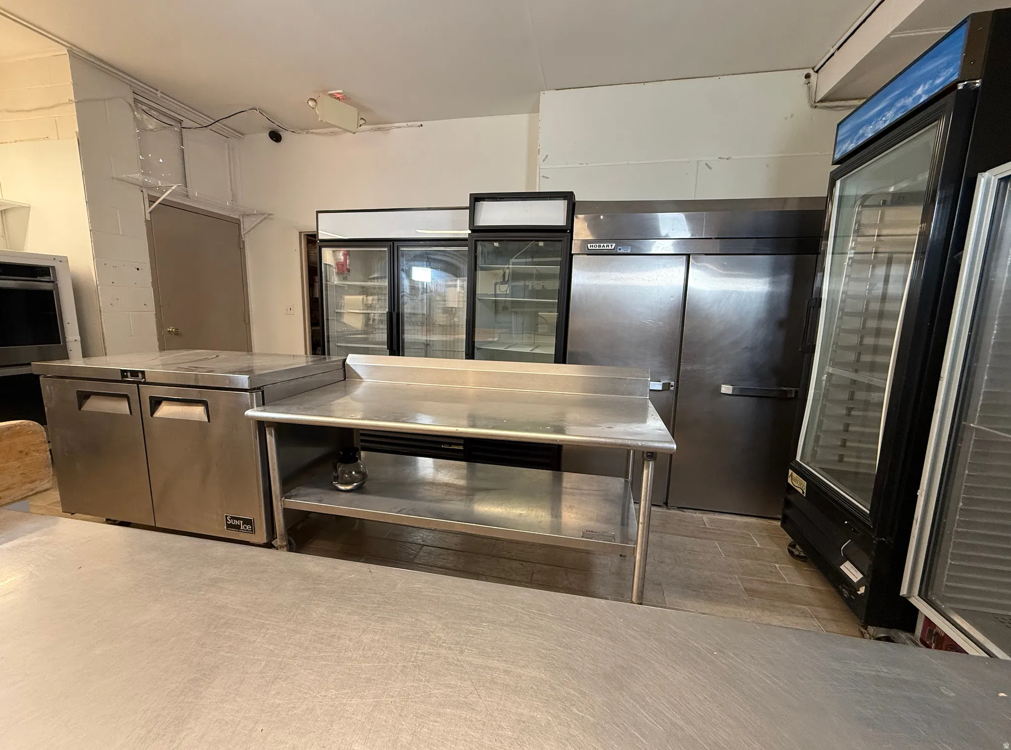 Kitchen with oven and stainless steel counters