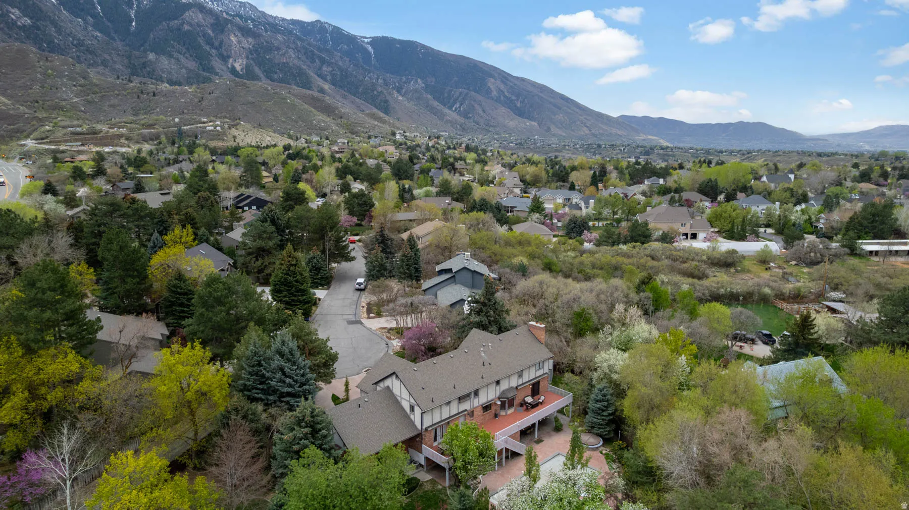 Aerial perspective of suburban area featuring mountains