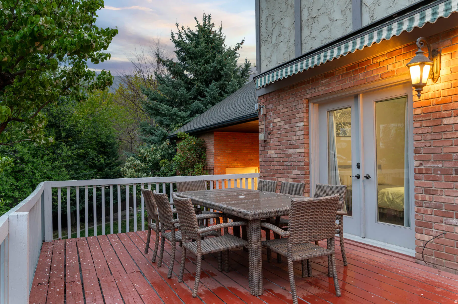 Deck featuring outdoor dining area and french doors