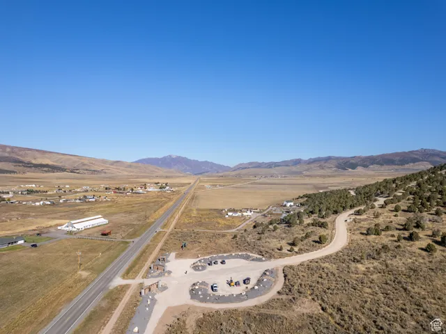 Aerial view of sparsely populated area with mountains