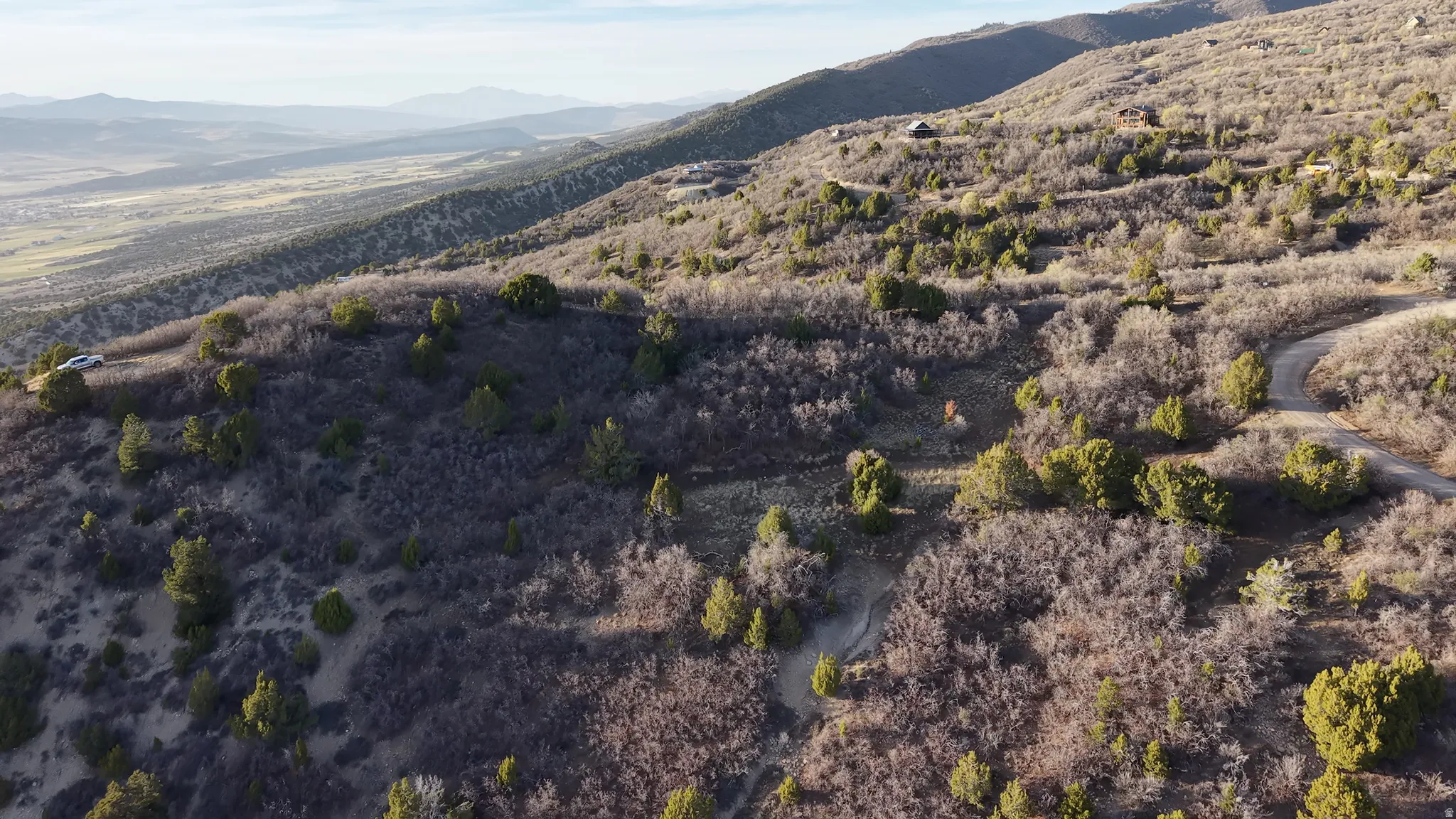 Expansive mountain terrain with varied natural flora