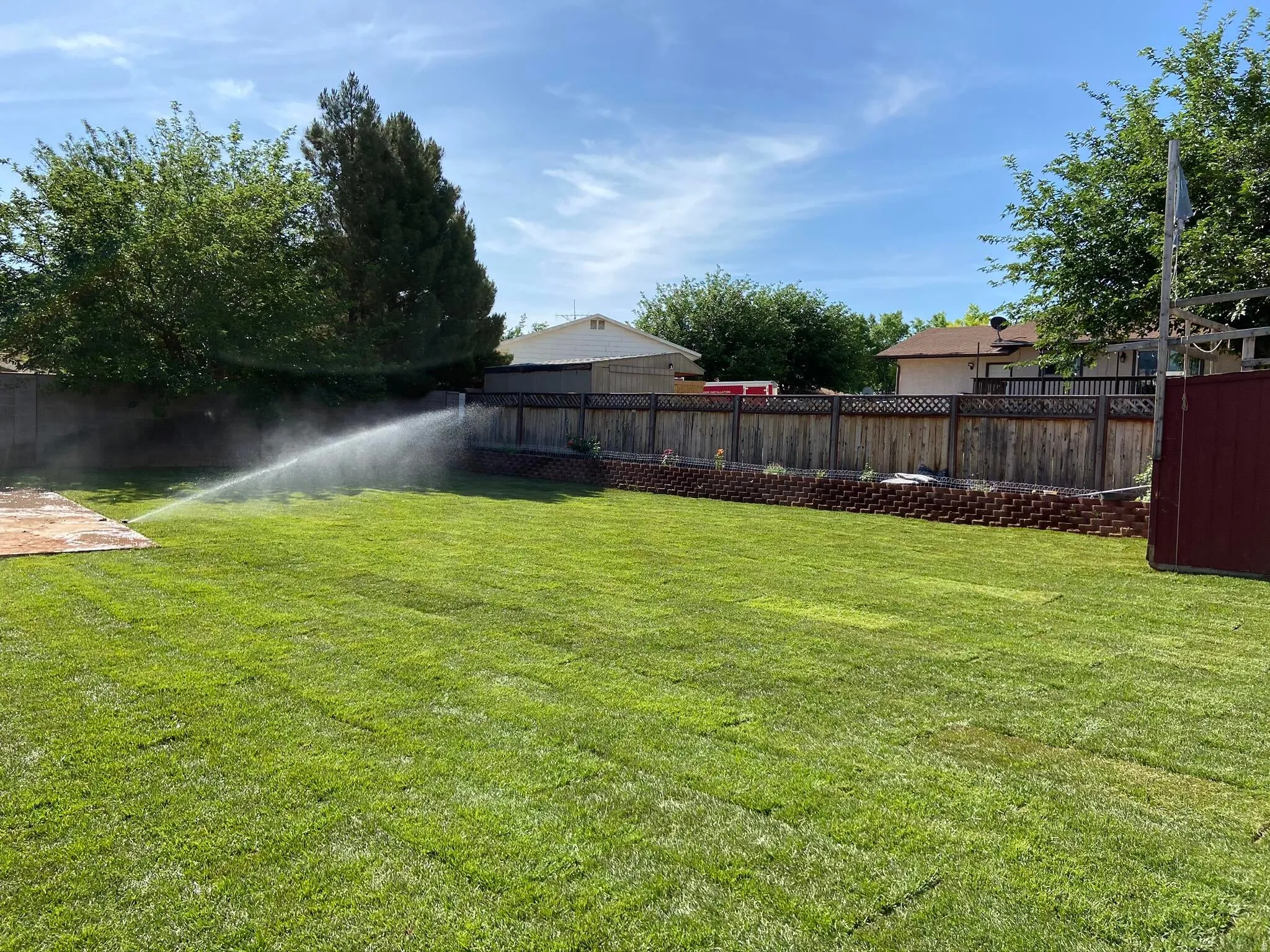 View of fenced backyard
