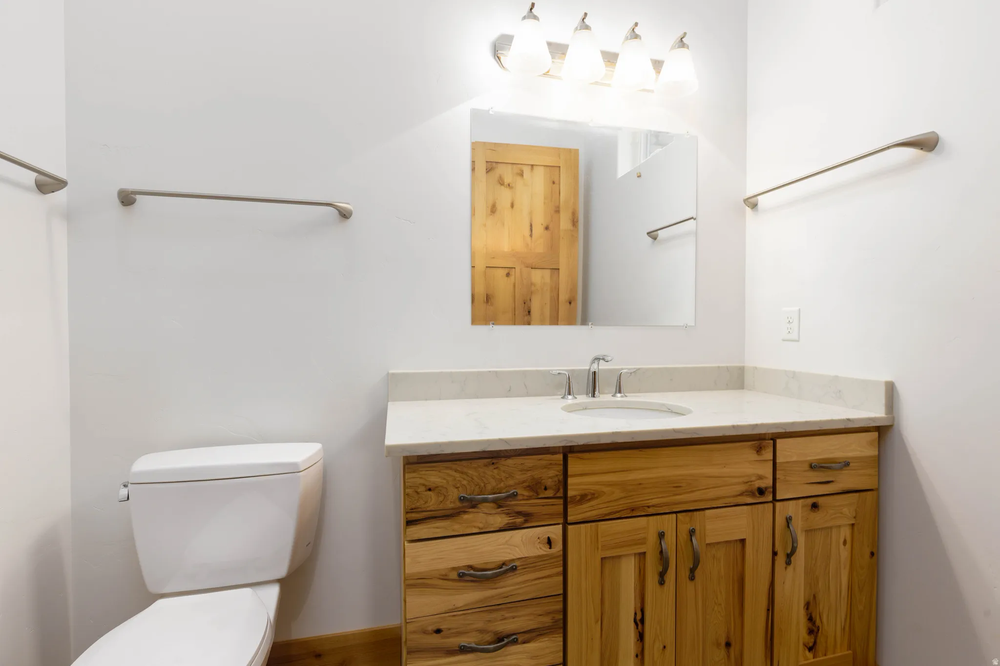 Half bath with toilet and vanity