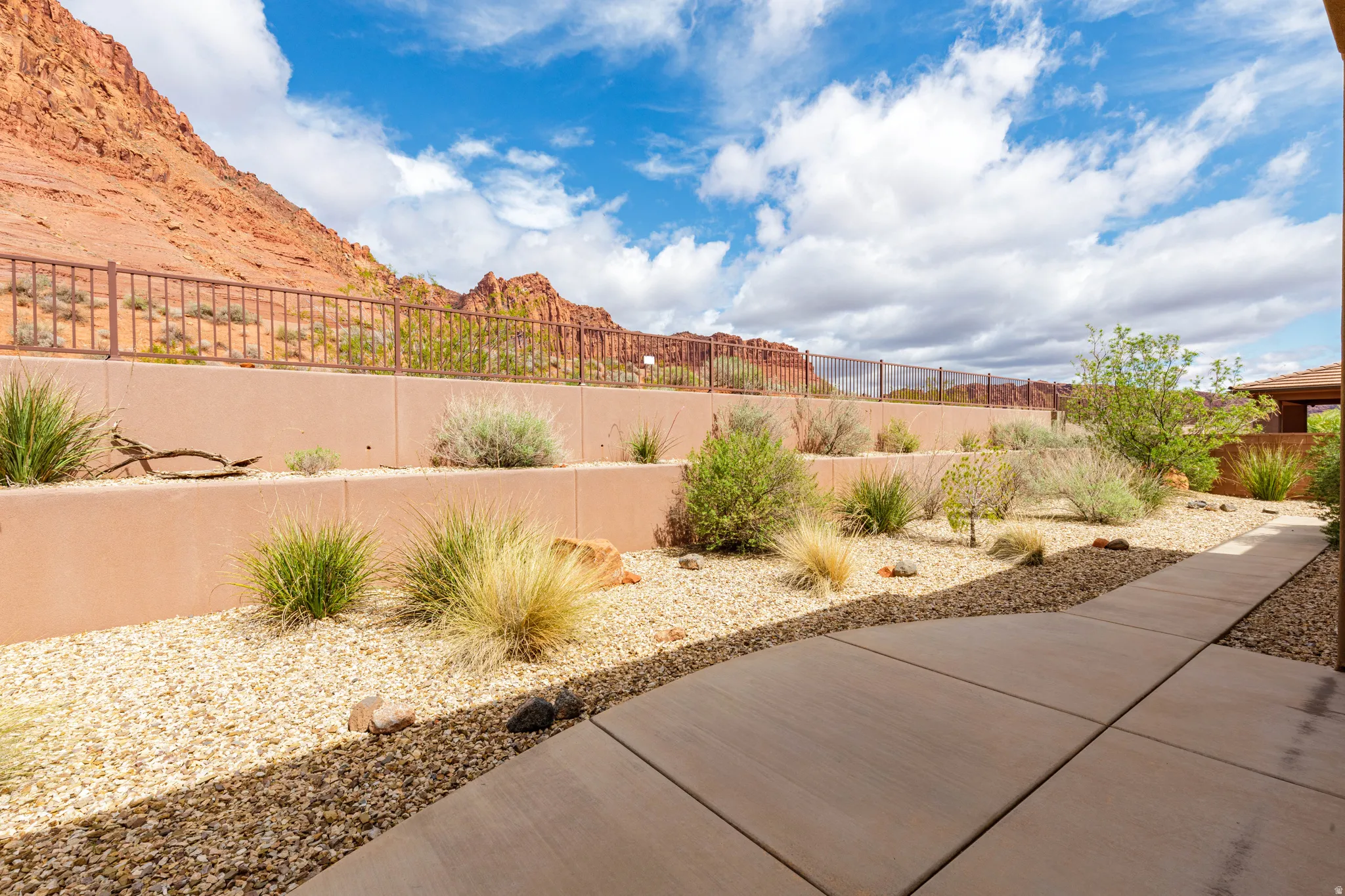 Fenced backyard with a mountain view
