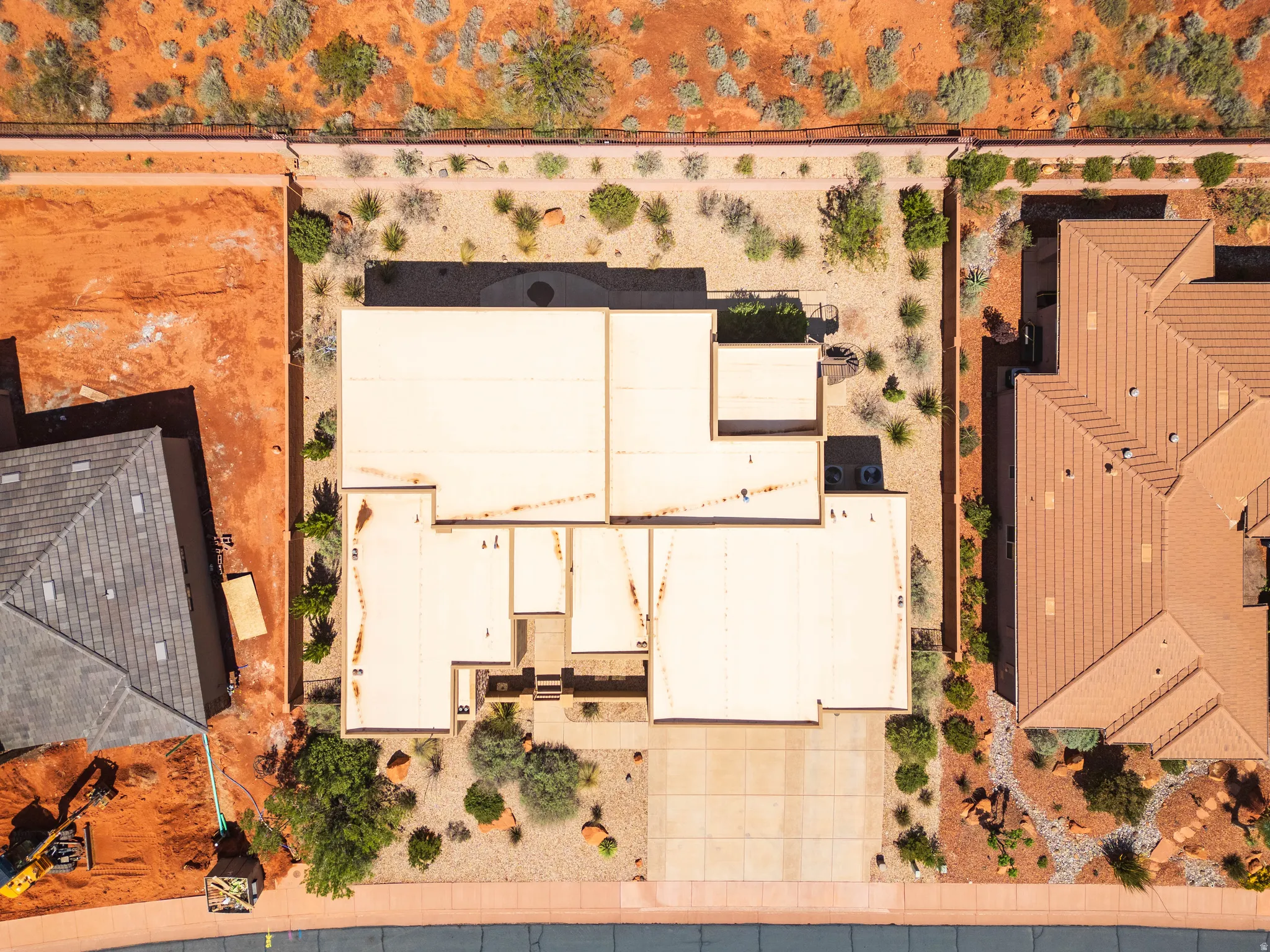 View of subject property featuring a desert landscape