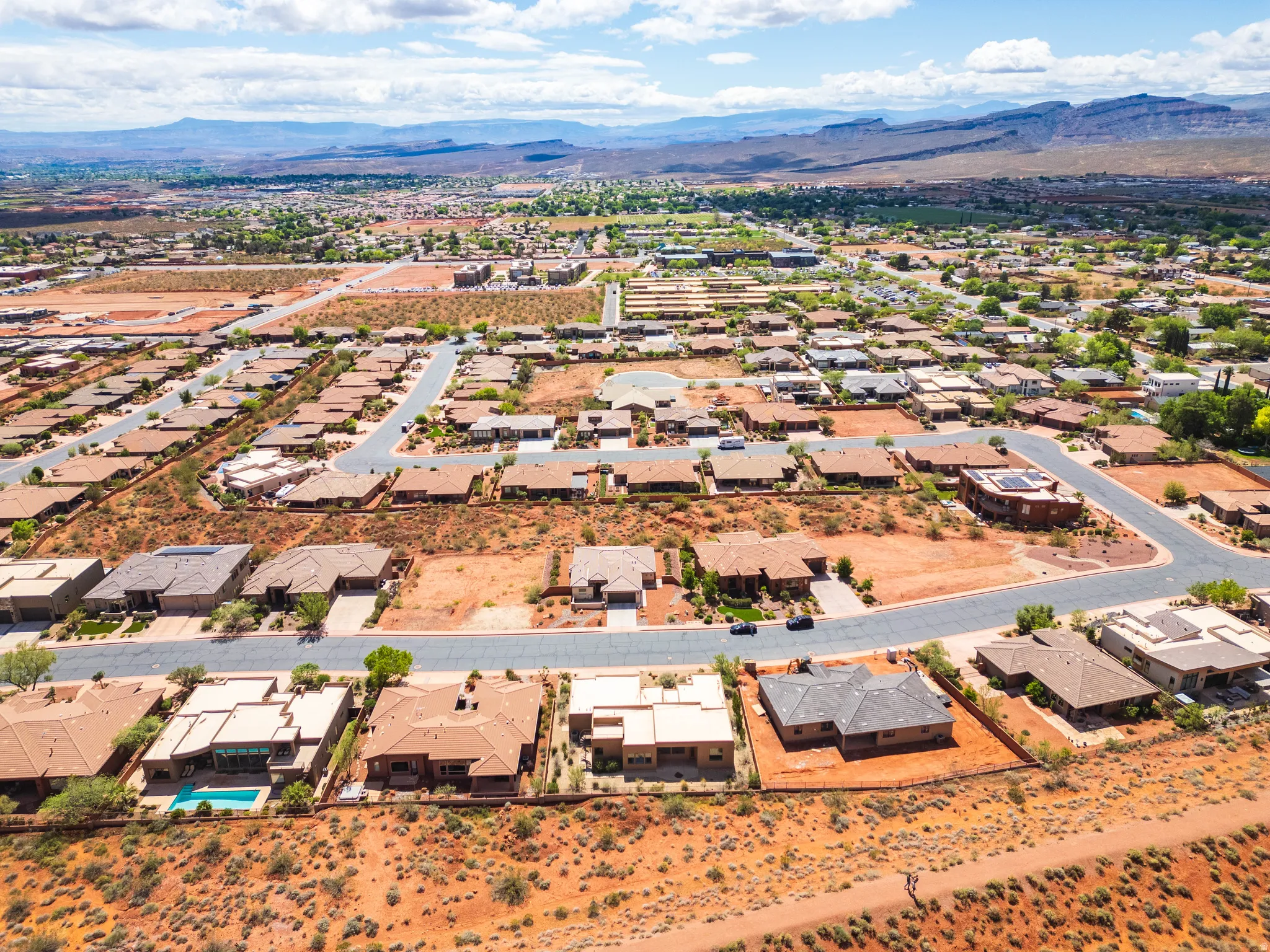 Aerial perspective of suburban area featuring mountains
