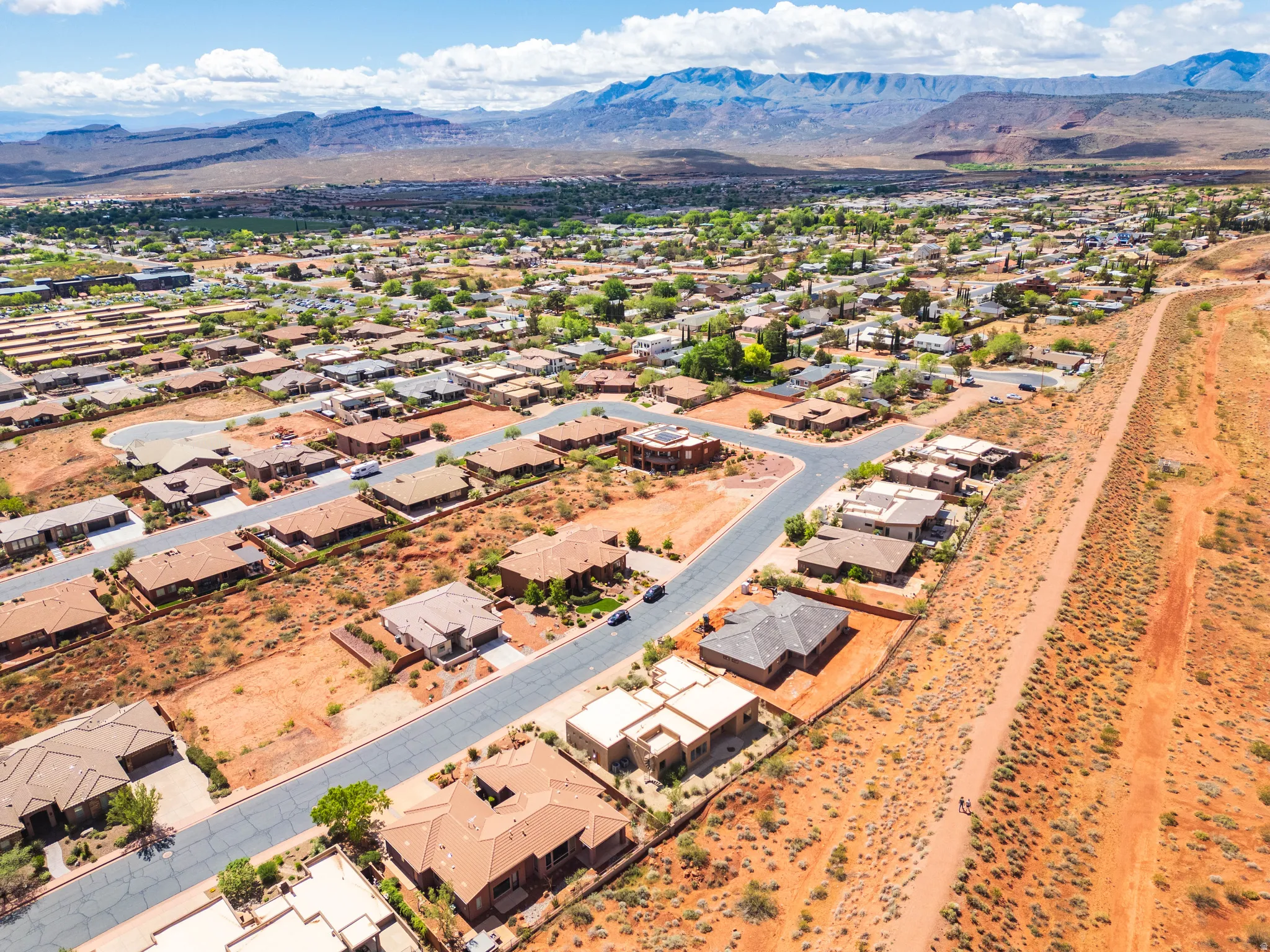 Aerial view of residential area with mountains
