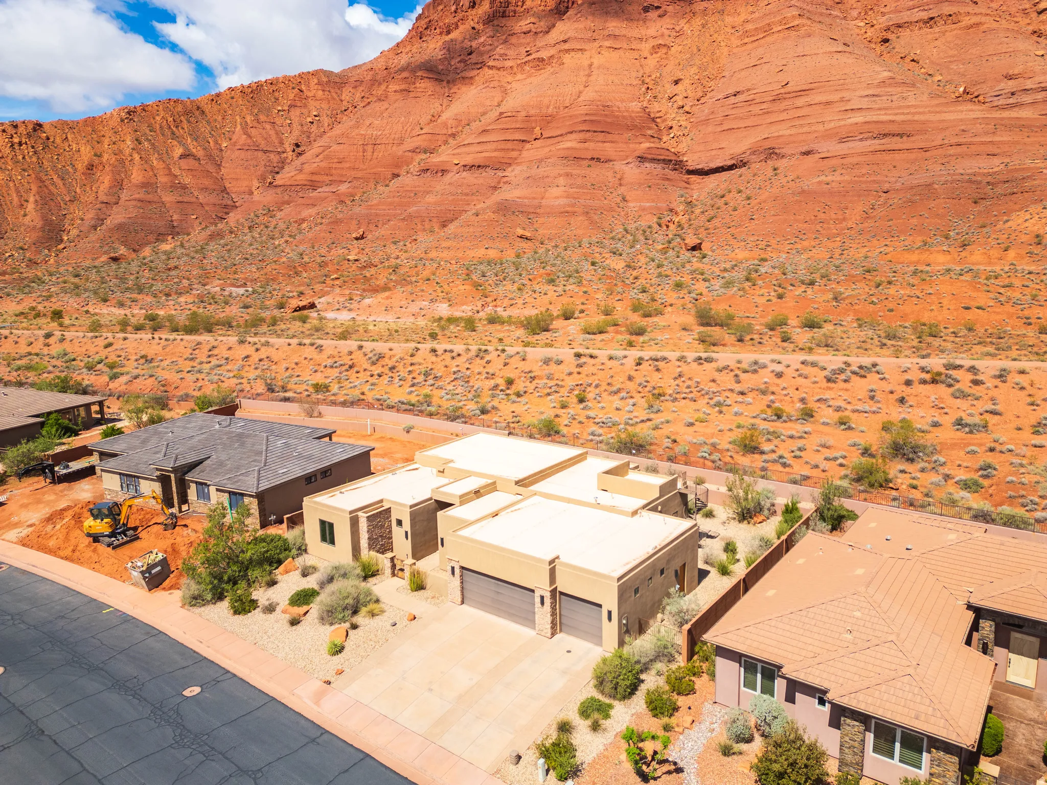 Overview of rural landscape with a desert landscape and a mountain backdrop