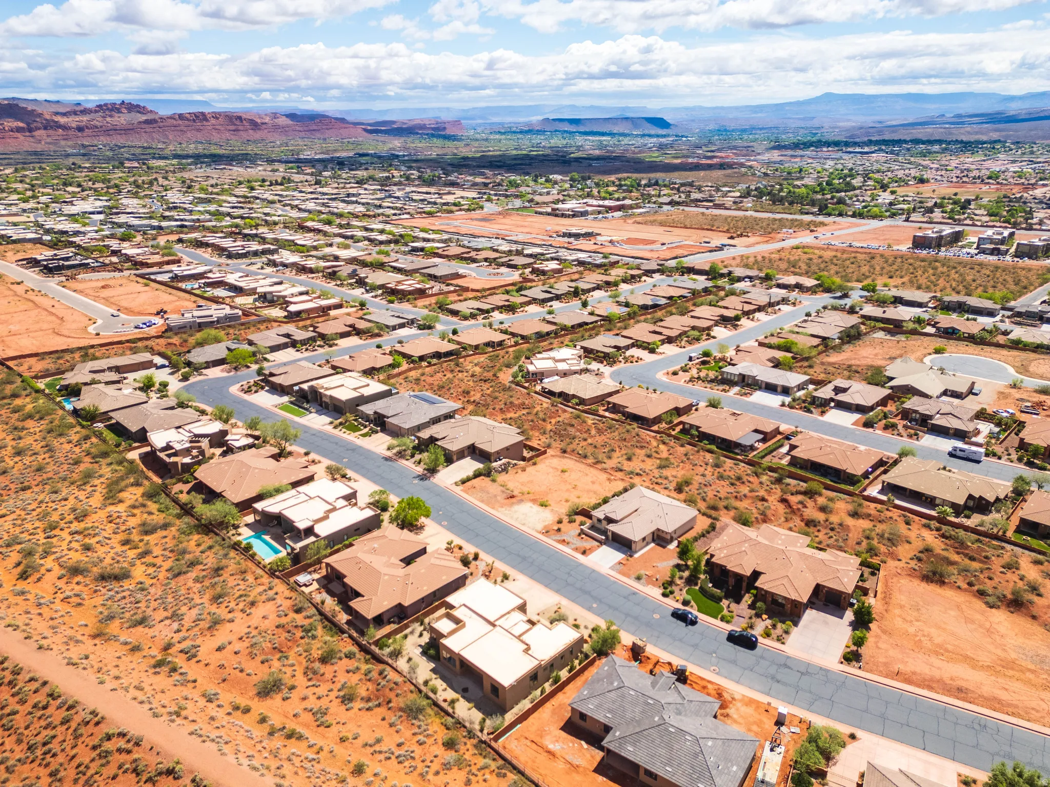 Aerial perspective of suburban area with mountains