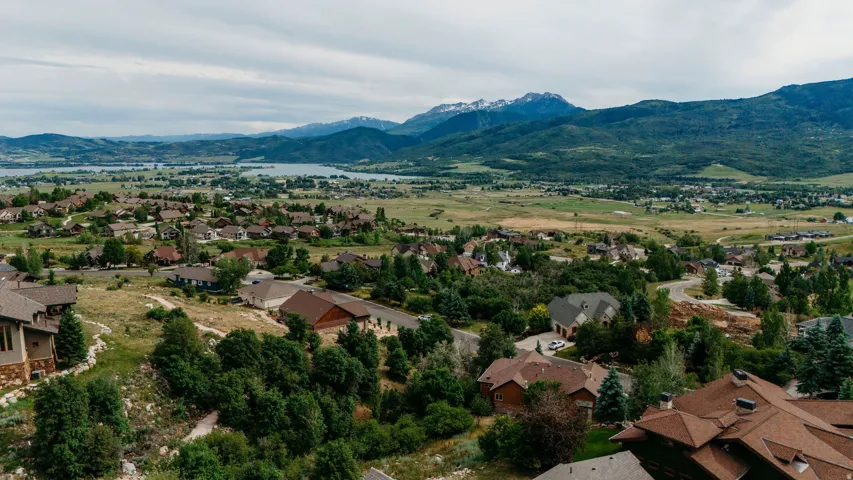 Aerial view of residential area with a water and mountain view