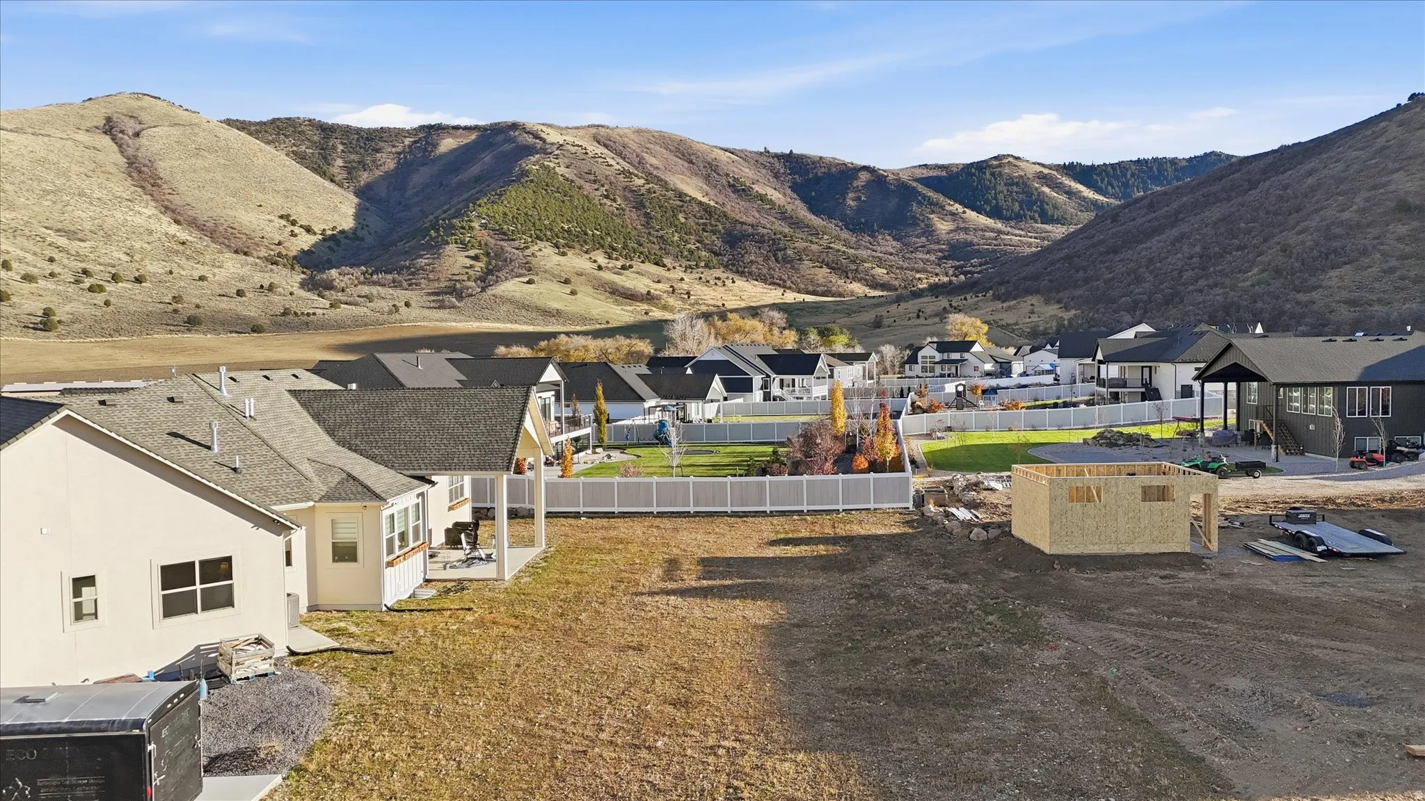 View of mountain backdrop with nearby suburban area