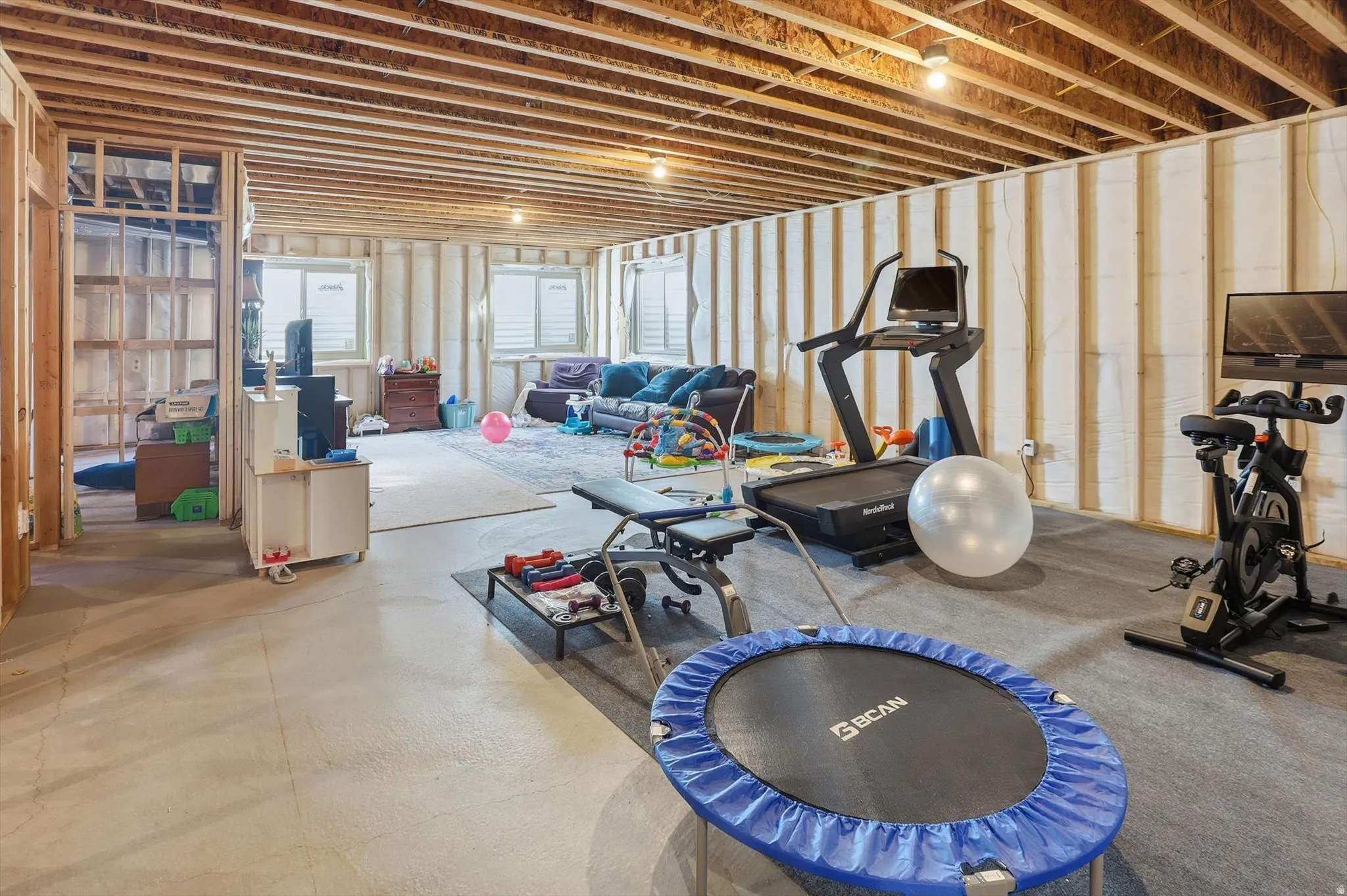 Exercise area with concrete flooring