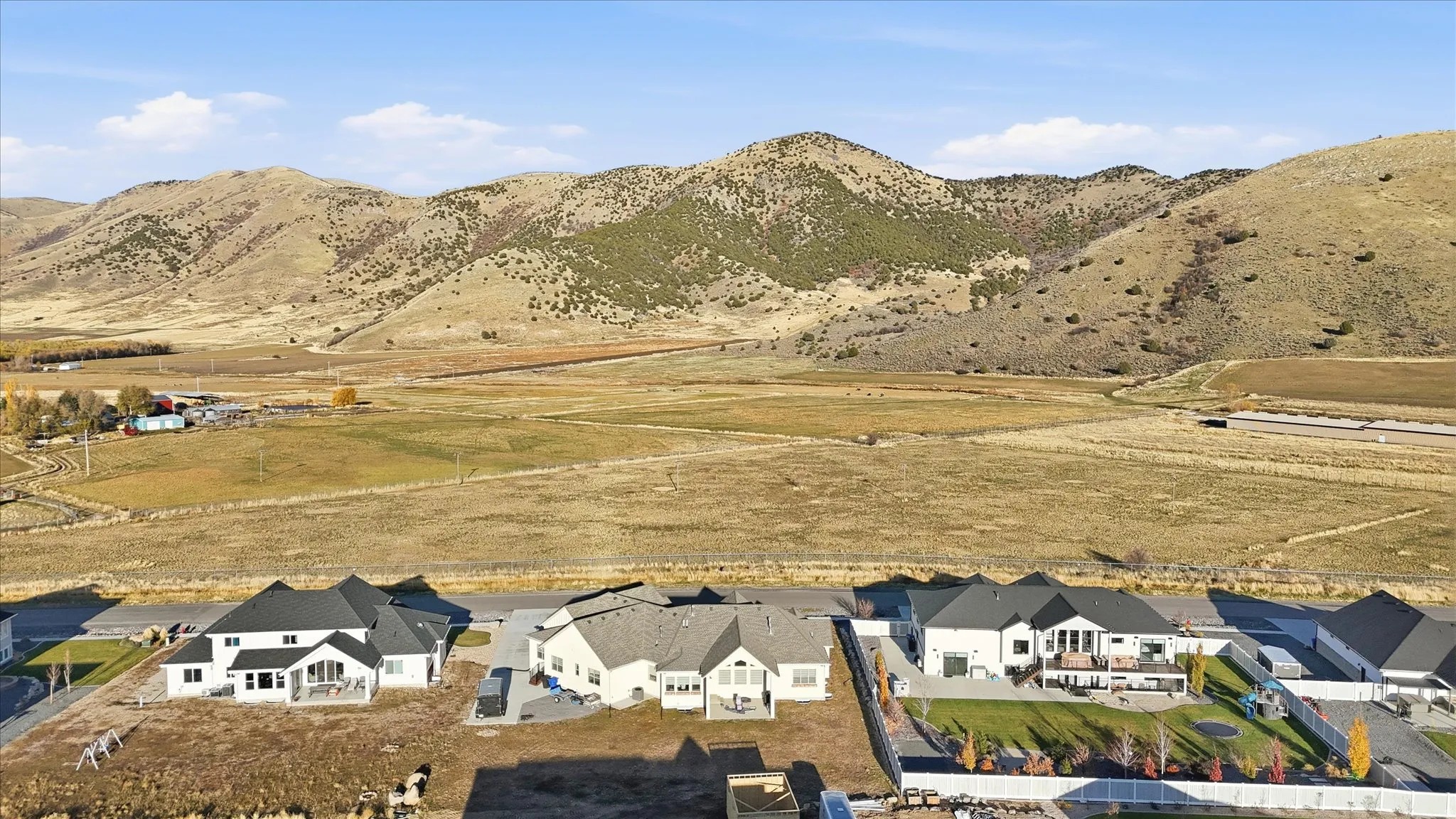 Aerial view of residential area with a mountainous background
