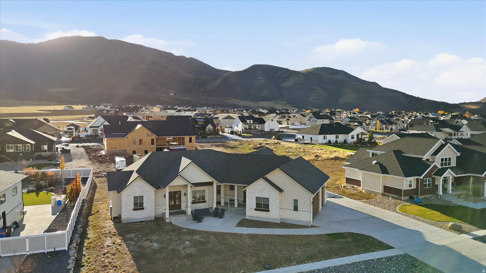 View of mountain backdrop with nearby suburban area